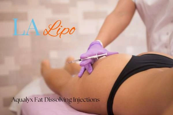 Woman having fat dissolving injections Merton on thighs
